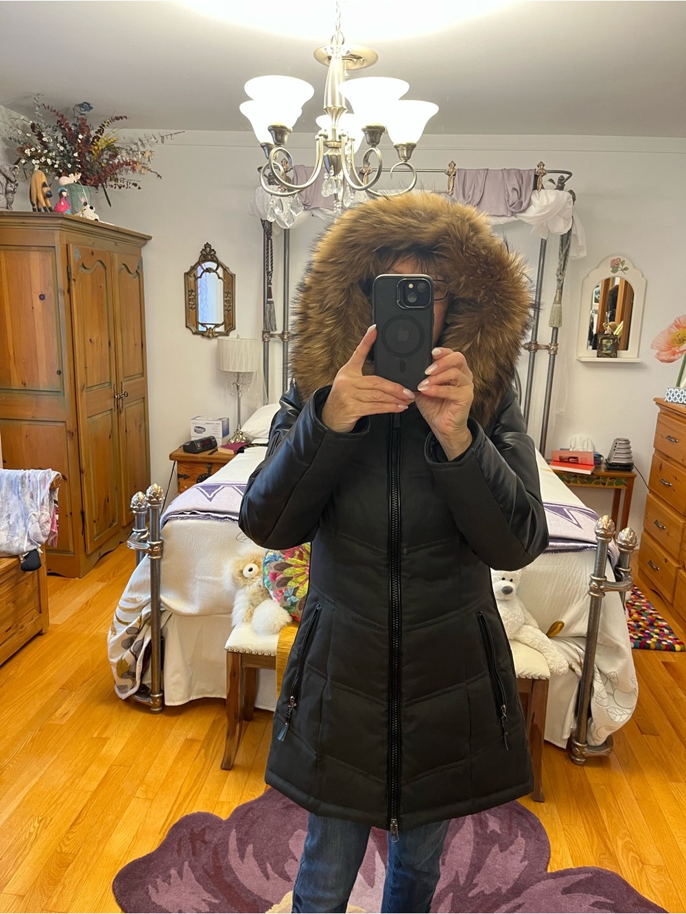 Women's Black Long Puffer Coat with real  Fur Hood and leather on the arms.